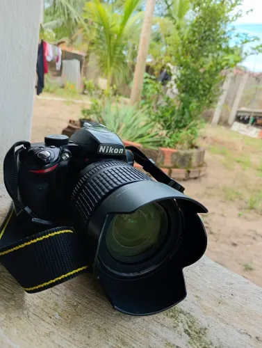 Câmera Nikon D3200 com lente 18-105