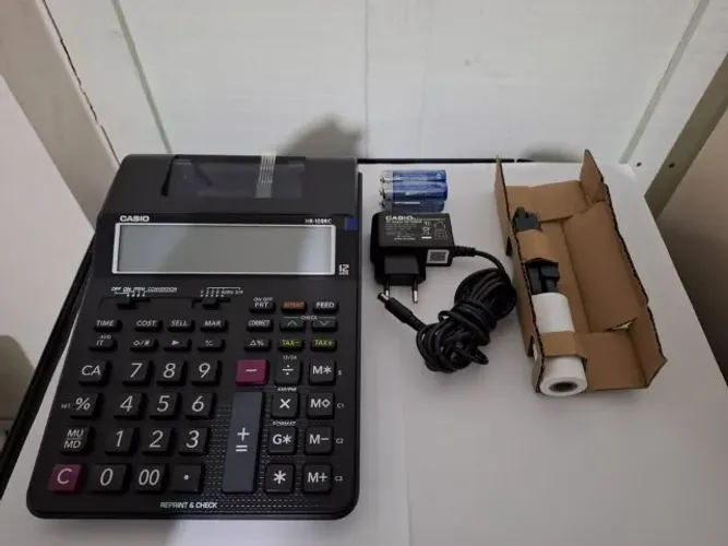 Calculadora Casio HR 100RC com 4 pilhas e fonte 110/220v