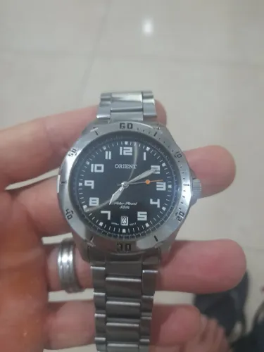Vendo um relógio orient funcionando perfeitamente 