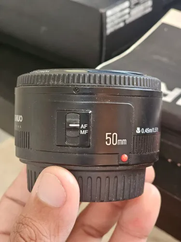 Lente 50 mm yongnuo mais duas lentes 18-55 cânon