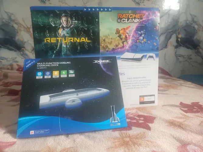 Playstation 5 um controle e 5 jogos 2 ps5 e 3ps4.