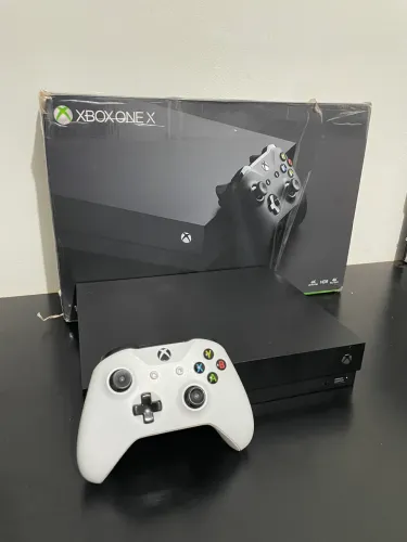 Xbox one x - 1 terá - SEMI NOVO COMPLETO