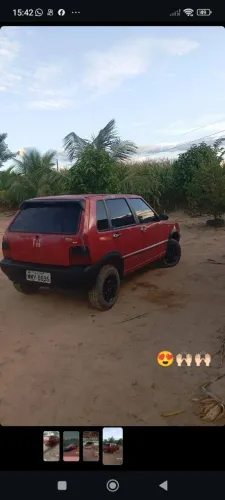 Ar condicionado gelando , vidro elétrico, som , 4 pneus novos 