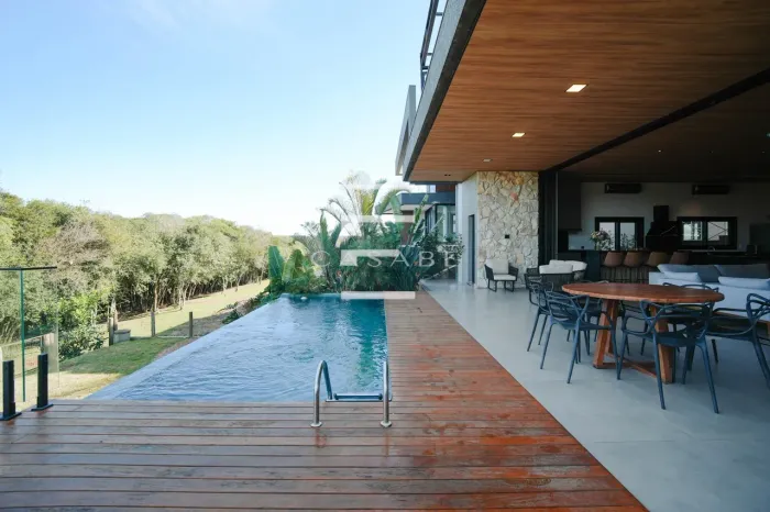 Casa térrea de 306m² com piscina borda infinita no Prado Bairro Cidade