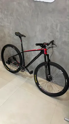 Trust em carbono tam 17