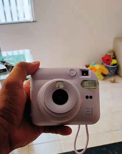 Câmera fotográfica instantânea
