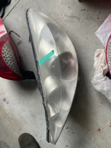 FAROL PEUGEOT 207 - LADO ESQUERDO