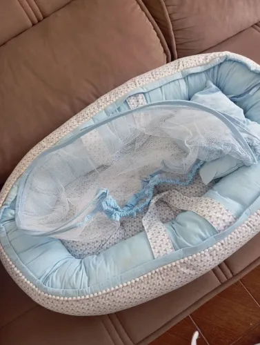 Ninho com mosquiteiro para bebê 