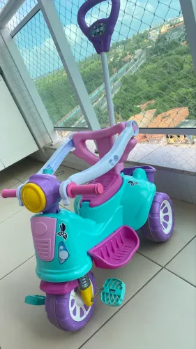 Triciclo menina