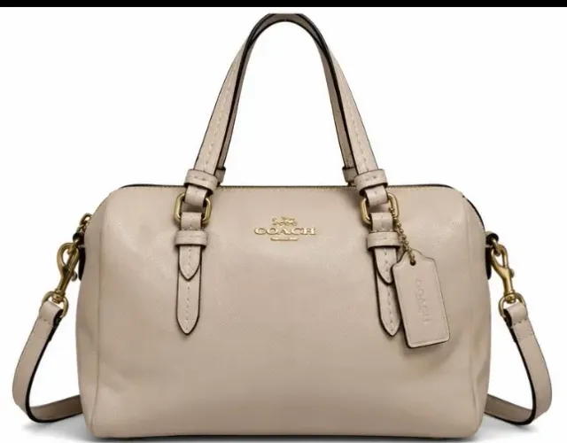 Bolsa coach original com código de veracidade 