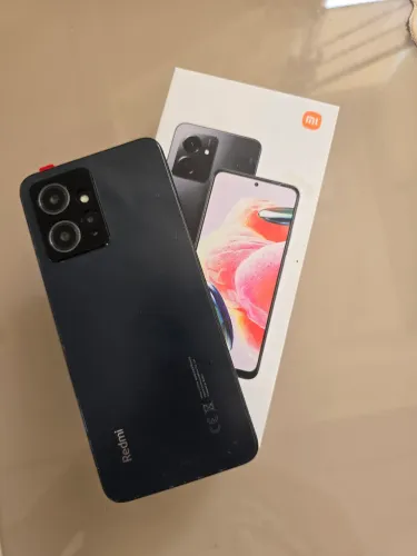 Celular Xiome Redmi 12 5G.