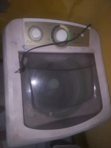 Máquina de lavar com defeito