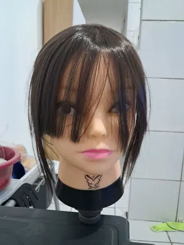 Cabeça de boneca para treino 