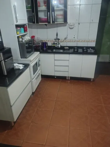 Vendo ou troco terreno com duas casas 