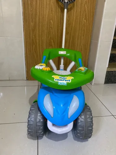 Carrinho de empurrar calesita