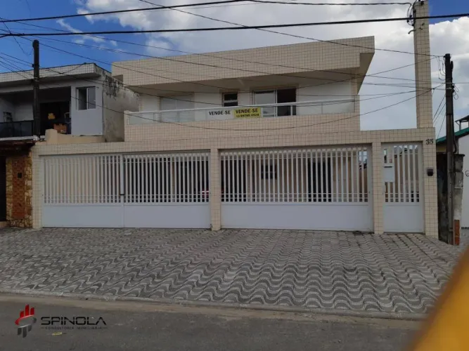 Casa com 2 dormitórios à venda, 67 m² por R$ 315.000,00 - tude basto - Praia Grande/SP