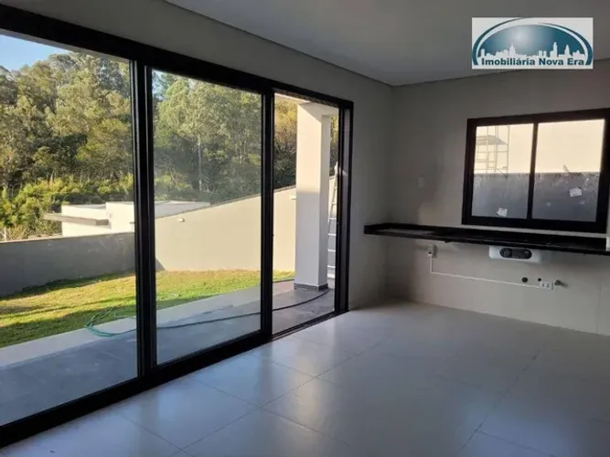 Casa com 3 dormitórios à venda, 197 m² por R$ 1.590.000,00 - Condomínio Reserva dos Jatobá
