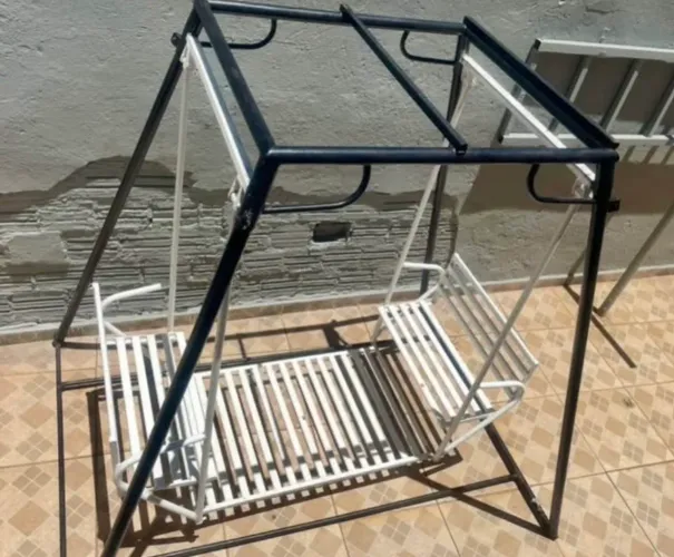 Balanço duplo de ferro