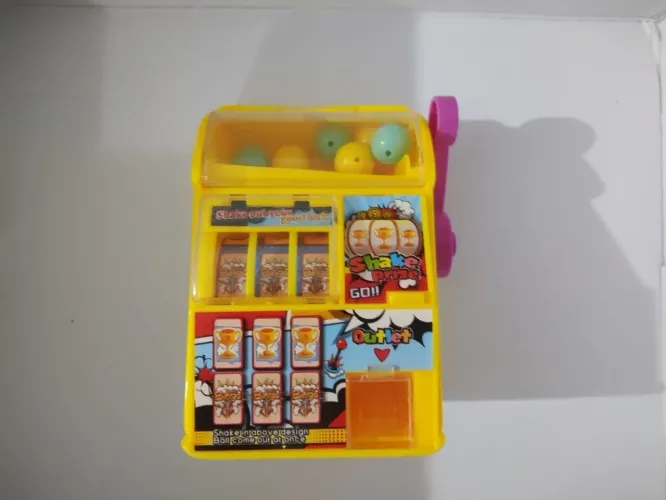 Vendo brinquedo mini máquina caça níquel