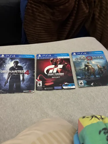 Jogos PS4 Originais - Uncharted 4, God of War e Gran Turismo Sport