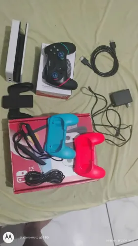 caixa e acessórios Nintendo switch OLED