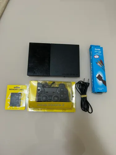 PlayStation 2 + 213 jogos + 1 controle novo