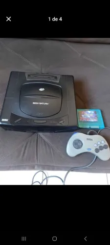 Sega Saturn com Saroo cheio de jogos