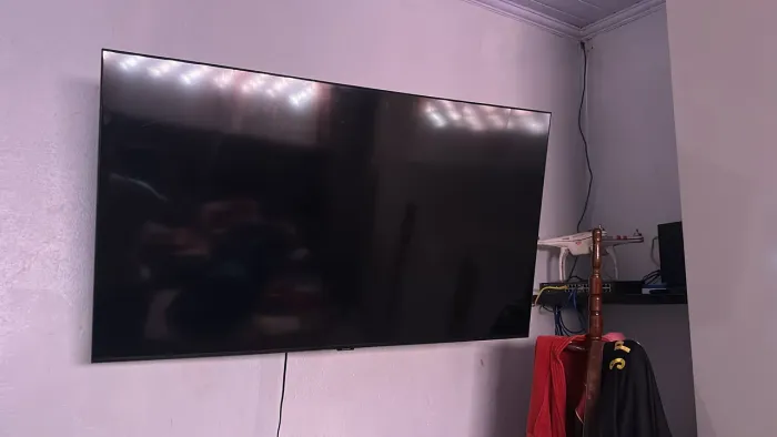 T V