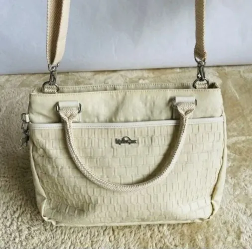 Bolsa kipling original creme comprada no Japão