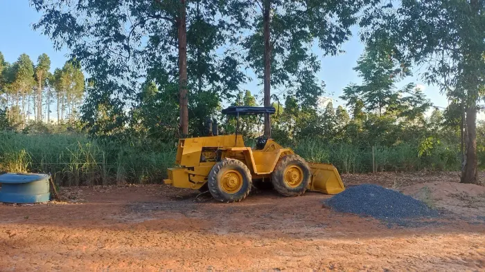 Troco pá carregadeira por imóvel rural