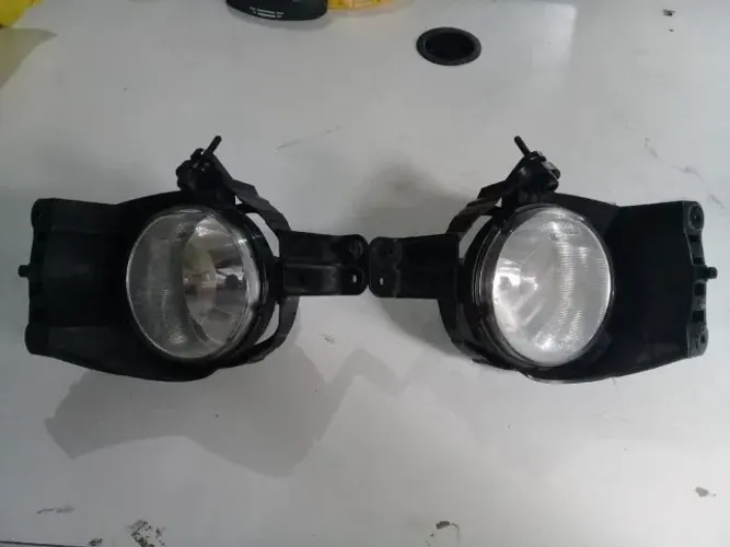 Farol De Milha Onix Prisma Par C/Moldura Original