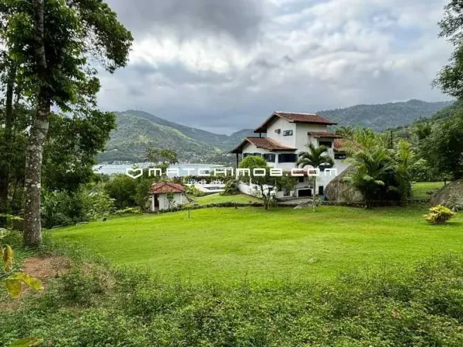 2 lotes com uma Casa à venda no condomínio Portogalo - Angra dos Reis.
