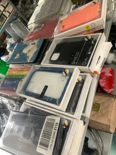 Lote 50 capinhas e película de vidro