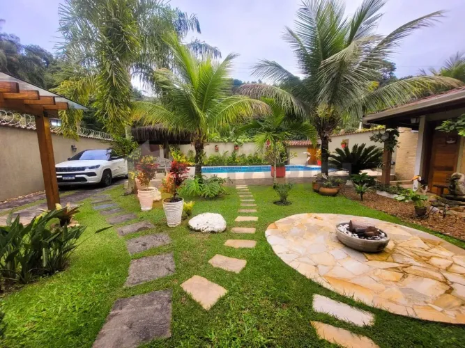 Casa com 3 dormitórios à venda, 179 m² por R$ 890.000,00 - Capricónio III - Caraguatatuba/