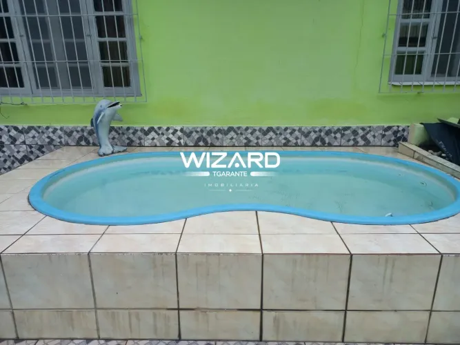 Casa à venda de 271m² com 2 quartos, 6 vagas e piscina em Itanhaém