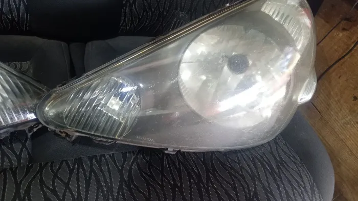 Farol do Honda fit o par original zap *