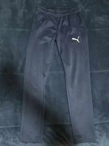 Calça Puma cor azul marinho. tamanho P