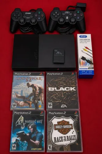 Playstation 2 slim dois controles. Leitor 100%. 4 jogos DVD.
