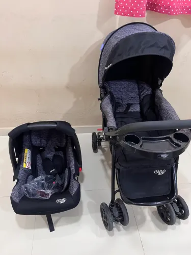 Carrinho e bebê conforto