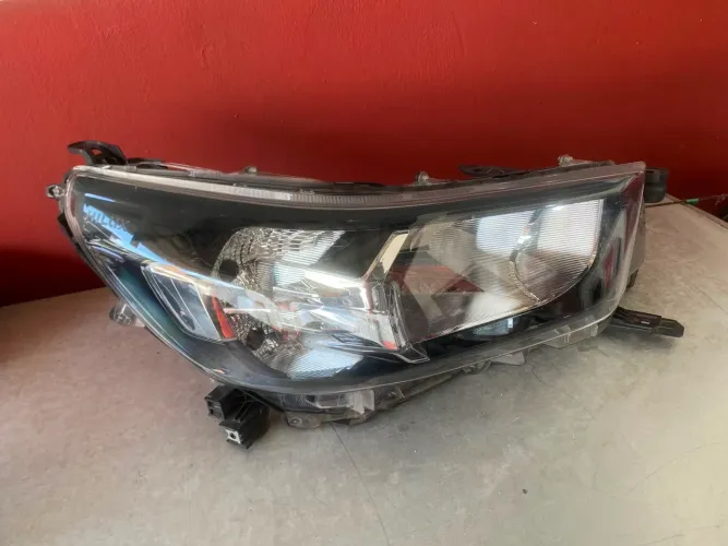 Farol Hilux mod 20/24