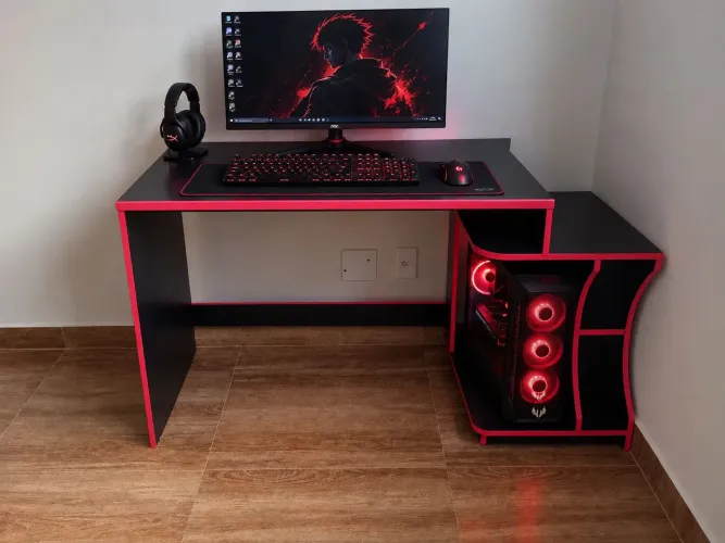 Mesa Gamer Escrivaninha Valdemóveis na cor preto com detalhes em vermelho.
