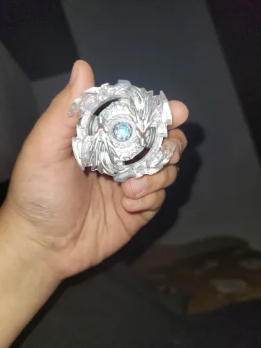 Beyblade burst luinor dragão junto com lançador de cordinha