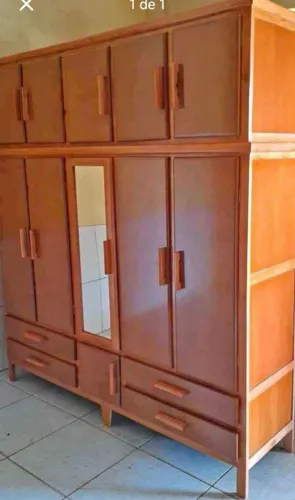 Guarda roupa novo de madeira faço entrega 5 portas, por favor somente se for comprar