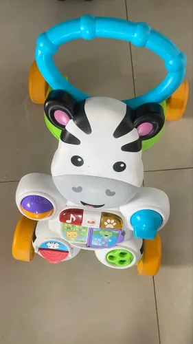 Andador ,carrinho de passeio.