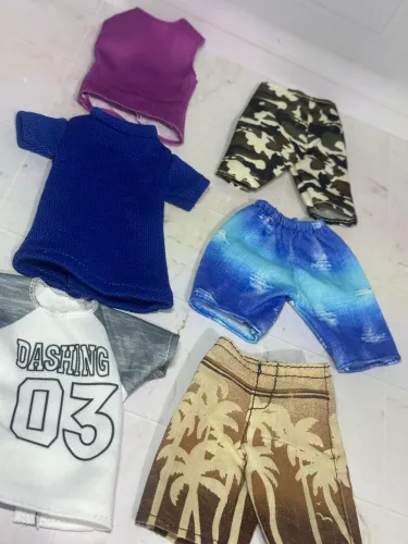 Lote boneca barbie roupas de ken (separado 20rs cada peça) bmr original beach