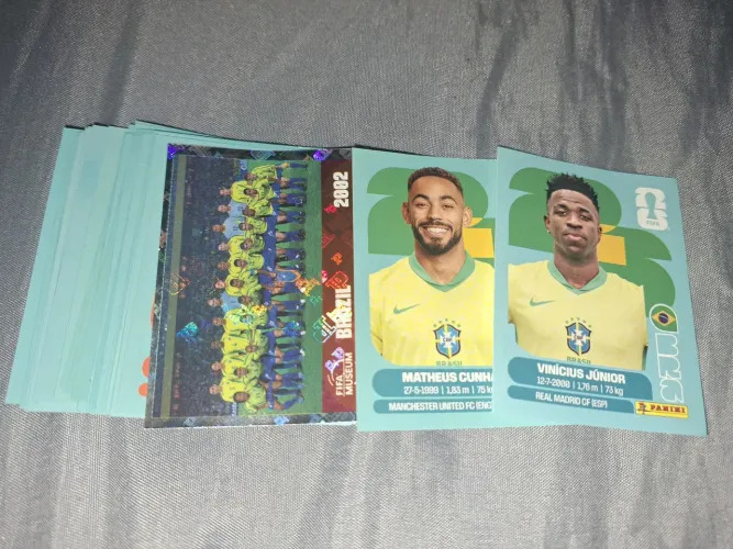 30 Figurinhas Copa 2026 Panini - VINÍCIUS JR + Matheus Cunha + Brilhante Brasil 2002