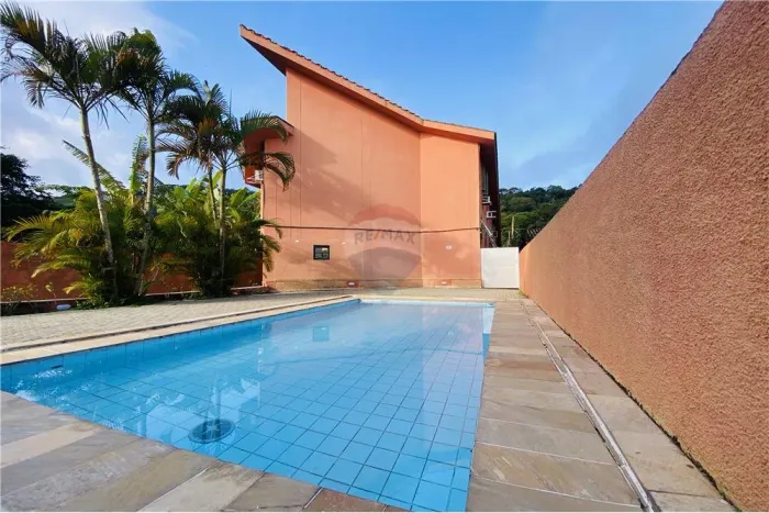 Casa em village com 2 quartos à venda por R$ 340.000,00 - Jardim Las Palmas - Guarujá/SP