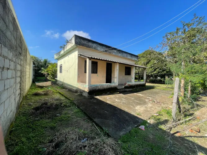 Casa com Grande Terreno - Ideal para Morar ou Investir!