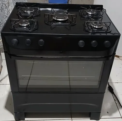 Vendo fogão 5 bocas mesa de vidro elétrico.