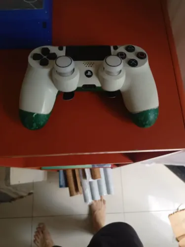 controle ps4 com defeito 